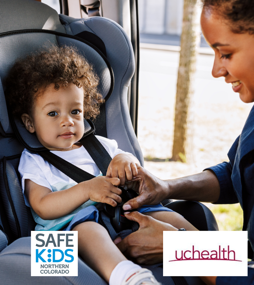 Child sitting in a car seat in a vehicle